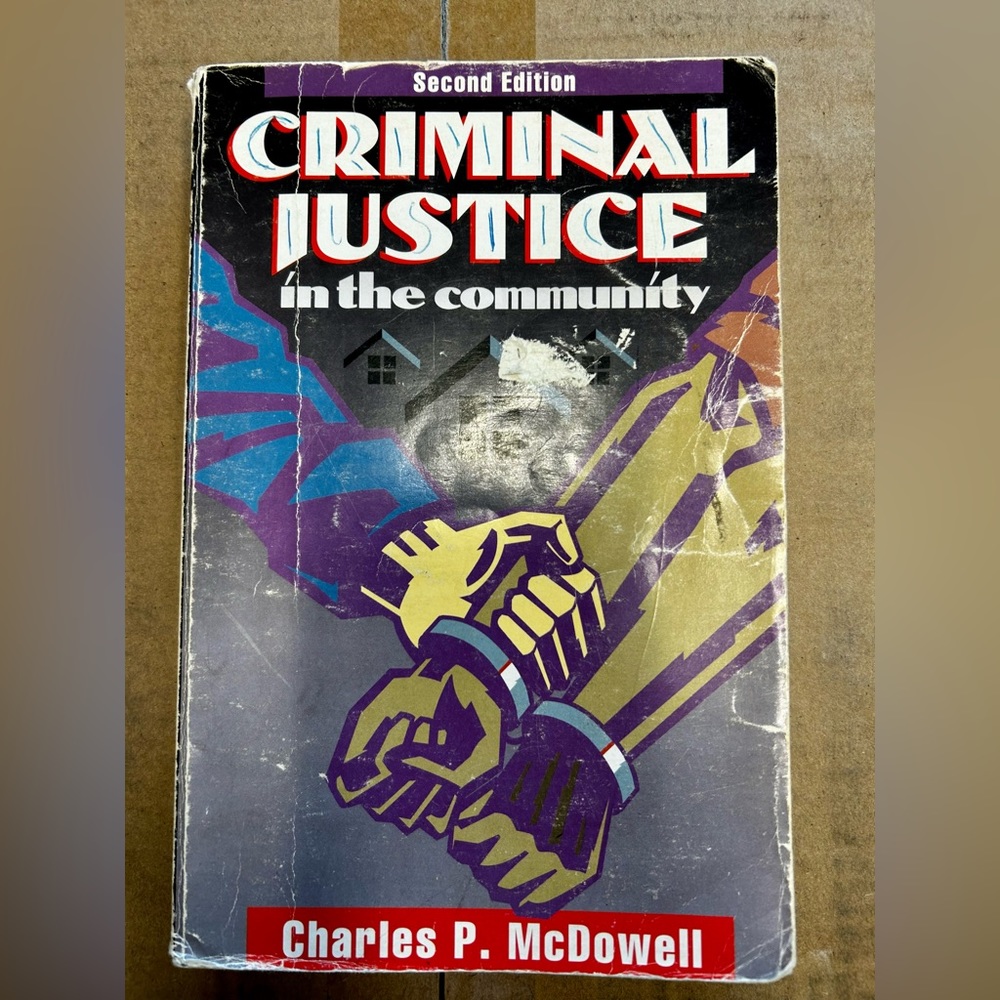 Criminal Justice in the Community by Charles P. McDowell ISBN 0-87084-559-4